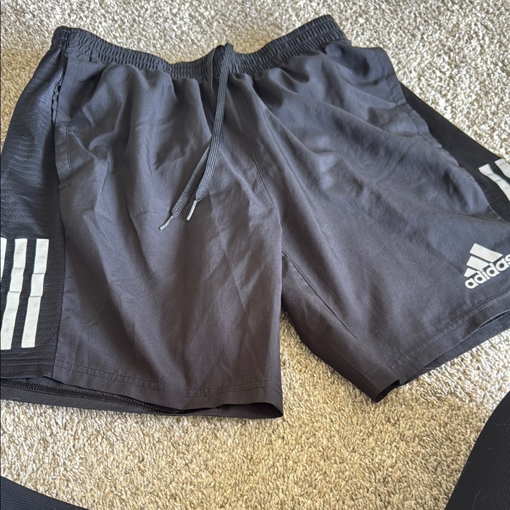 Adidas Black Athletic Shorts with Iconic Stripes